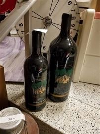 Assorted vintage dummy wine bottles empty