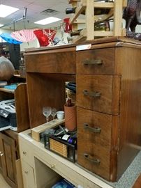 Antique sewing cabinet repurposed as vanity