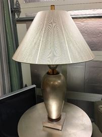 Merchandise Mart table lamp with metallic finish and string shade