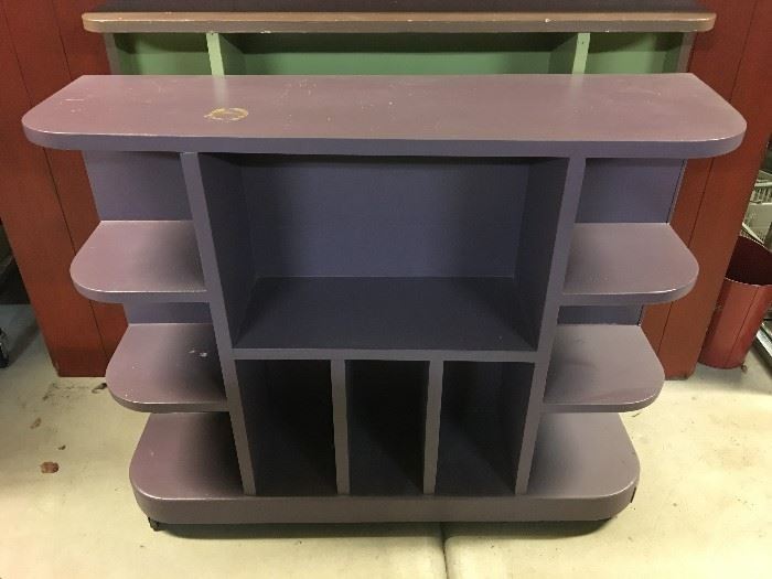 Art Deco wood bookcase on casters (some paint loss on top)