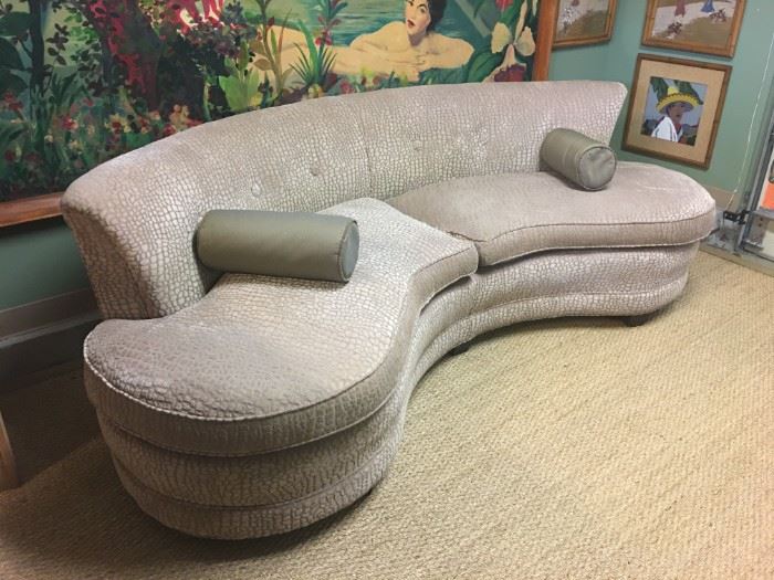 1950s kidney-shaped sofa professionally reupholstered in a champagne color crocodile print chenille. Also included - the pair of professionally fabricated bolster pillows. Great quality and heavy!