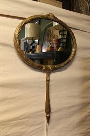 1960s hand mirror style wall mirror with plastic frame