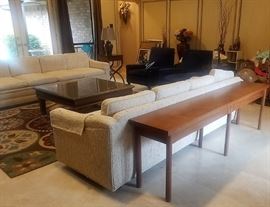Mid-century 4-cushion sofa set.  Dark blue arm chair set. Long, wood sofa table
