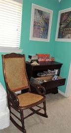 antique rocker, abstract art, small chest