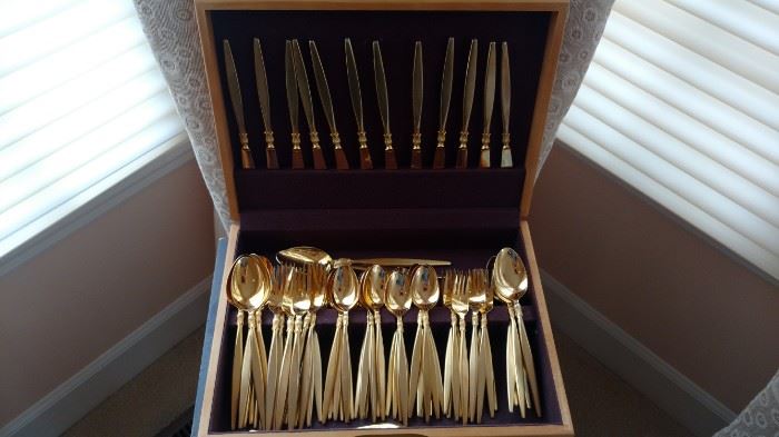 Gold finish flatware-service for 12