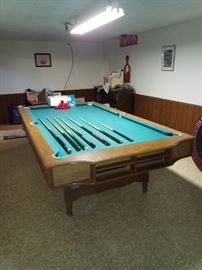 Pool table comes with lots of accessories 