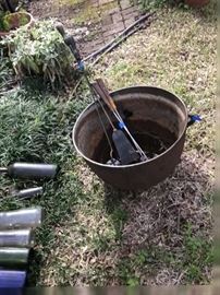 old cast iron kettle and bottles