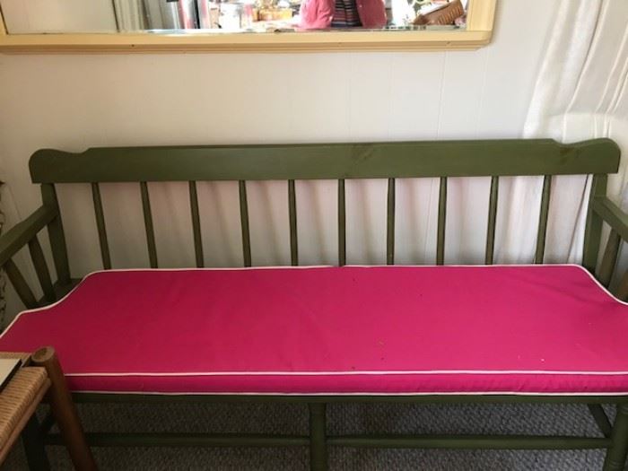 Matching Green Painted Benches with Pink Cushions.