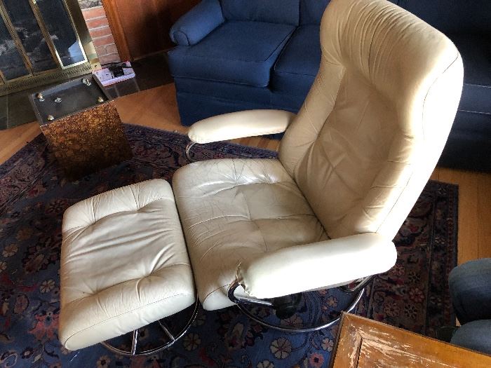 Pair of Ekones Stressless Swedish mid century chairs with ottomans