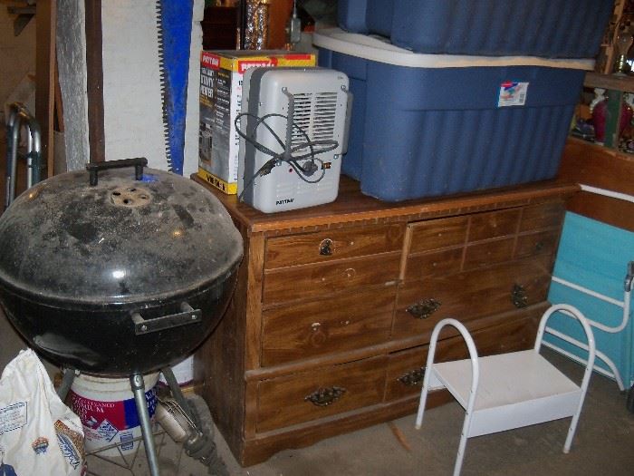 BBQ grill, dresser, two space heaters , three large storage bins and misc.