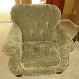 Olive Green Plush Velvet Tufted Upholstery Armchair with nailhead trim.
