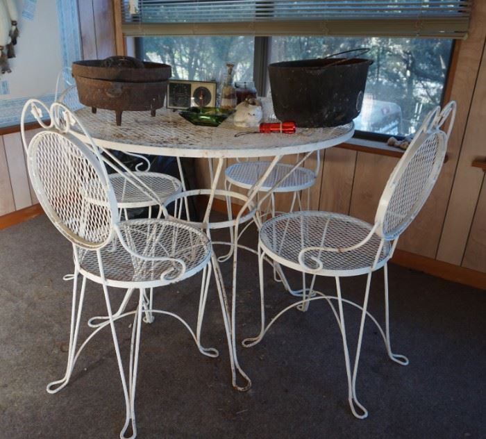 Metal patio set and cast iron pots