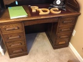 Early American vintage roll top desk