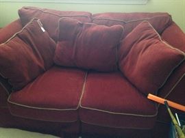 The loveseat has matching oversized chair.