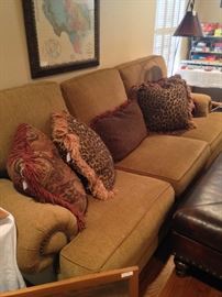 Another large sofa and assorted pillows