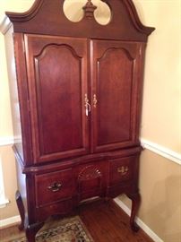 Very versatile Queen Anne leg entertainment center 
