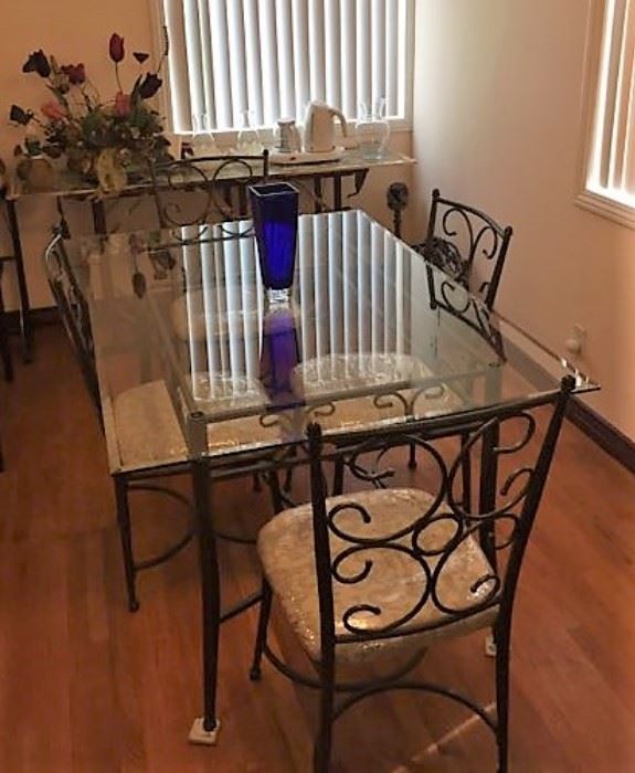 The other dining set, both with matching chairs.