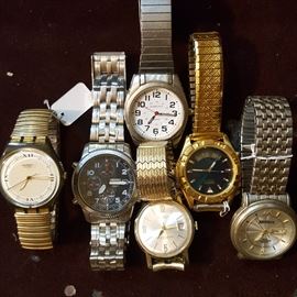Several brand-name men's watches -- all in running condition