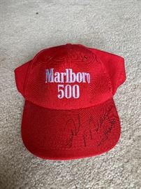 Signed by “Rick Mears”. A four time Indy 500 winner. 