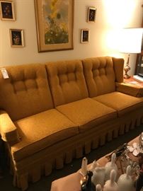 #49	gold color button back sofa 82 long	 $60.00 	