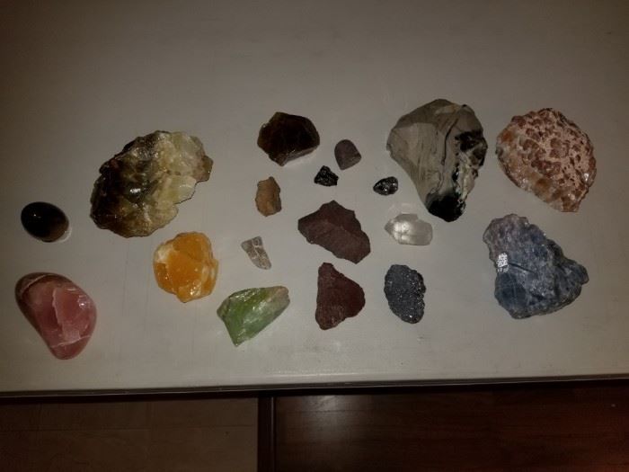A portion of the rock collection  And rock tumbler.