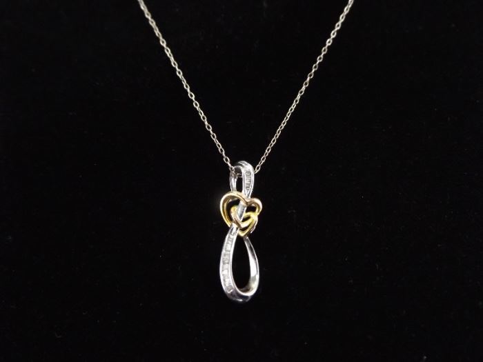 .925 Sterling Silver Baguette Diamond Accented Heart Knot Pendant Necklace
