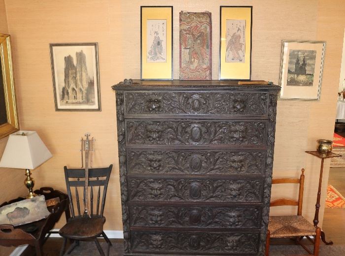 carved dresser, framed works on paper and silk