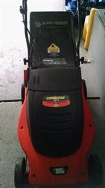 CLOSE-UP...CORDLESS  CMM1200 24 V  RECHARGEABLE  LAWN MOWER
