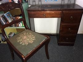 A vintage little desk and chair.