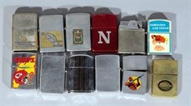 Assorted Lighters and Cases- Qty 12, Includes KC Chiefs, Nebraska Cornhuskers, Businessman's Assurance, Greenland, American Premium Stamp and More!