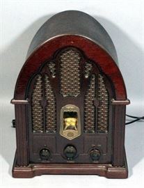 GE Replica 1988 Cathedral Style Wooden AM/FM Radio Model 7-4100JA. Powers On.