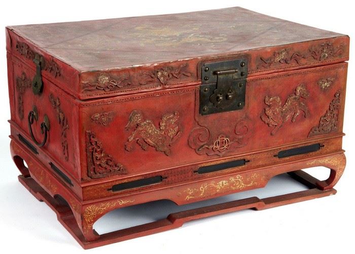 gilt and red lacquered leather chest