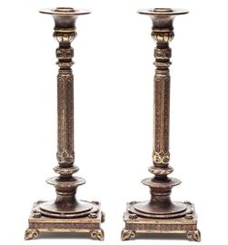 pair of Oscar B Bach studios bronze candlesticks
