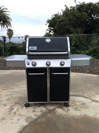 Weber Genesis gas grill on wheels, excellent condition