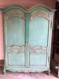 Carved antique wooden armoire&nbsp;[63 1/2" (highest point) x 56" (width) x 18" (depth)]
