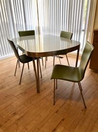 Midcentury kitchen table and four CB2-brand chairs