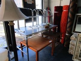 Tables, lighting, chrome chairs, rugs, wall mirrors