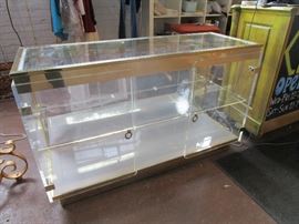 Stunning ucite and glass display case sold as is, (needs to be  rewired)