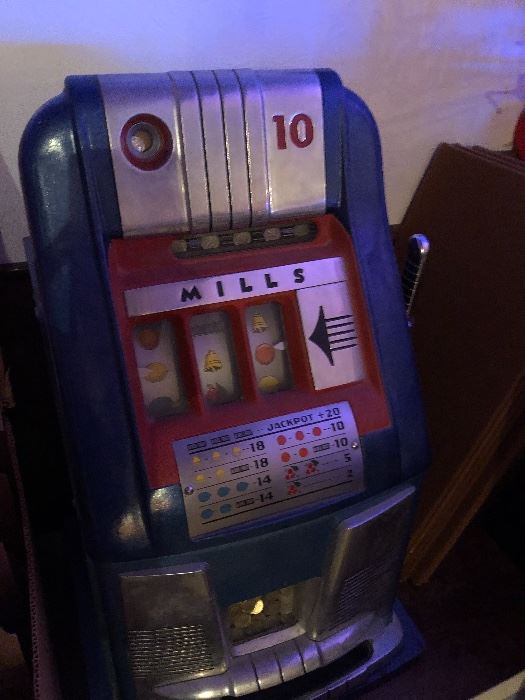 Who will win the jackpot with this Mills 10 cent one armed bandit.  (Oh, yes... we are leaving the coinage within.)