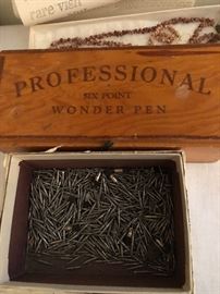 Vintage Wonder pen, and a box of dental bits.
