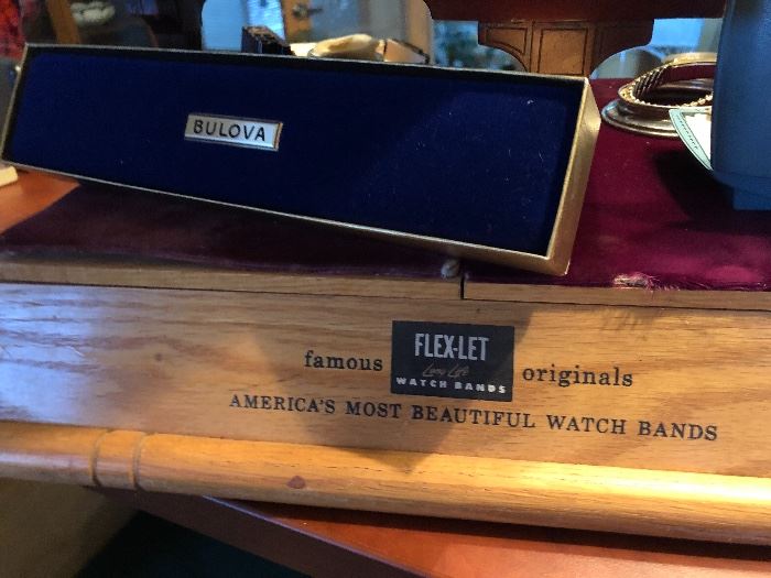 Cool old watch band display tray. (And empty velvet boxes)