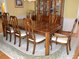 Marquetry top dining table with 8 painted chairs