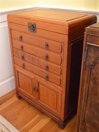 Asian-inspired silver cabinet