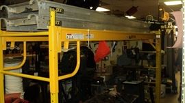 Bil Jax Scaffolding with both 6 foot and 10 foot sides.  Set comes with two 10 foot  planks that are in picture plus a 6 foor base platform that you can't see in picture.  Look like brand new!