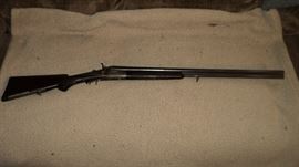 1920 German Drilling Gun   Side by Side 16 gauge shotgun with a 8 mm Rifle barrel underneath.  Engraved beautifully!