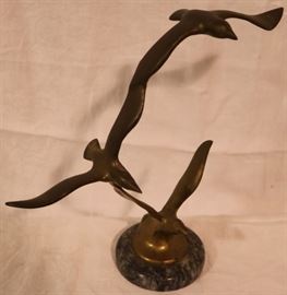 Bronze bird sculpture