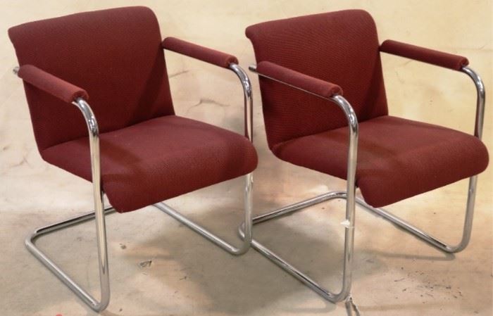 Pair tubular chrome arm chairs