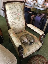 Inlaid upholstered mahogany arm chair, needlepoint foot rest, repousse tea set with tray