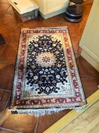 Hand knotted silk rug