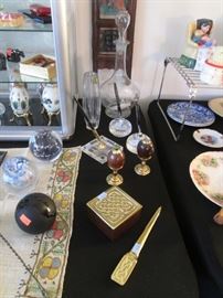 Various Paperweights and Egg-Shaped Kaleidoscopes on Stands